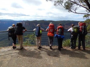 Eager backpackers take one last look down into the valley before the descent