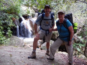 The awesome backpacking team takes a breather at yet another cascading waterfall
