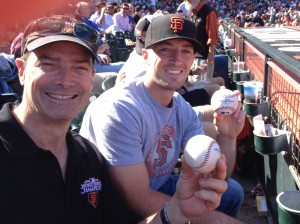 Nephew Brad and I showing off our prized foul balls - a bonus to a great day