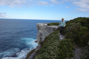 Julie carefully negotiating the trail on the edge of Botany Bay National Park