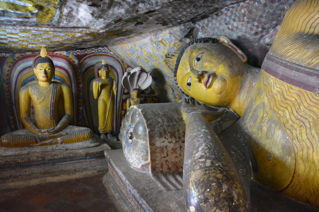 A reclining Buddha and a couple more for good measure, all resting peacefully in the Dambulla Rock Temple