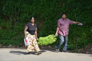 Bargain hunters returning from the local market in Ella