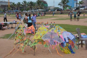 Plenty of colour and movement on the Galle Green - kites ready for action