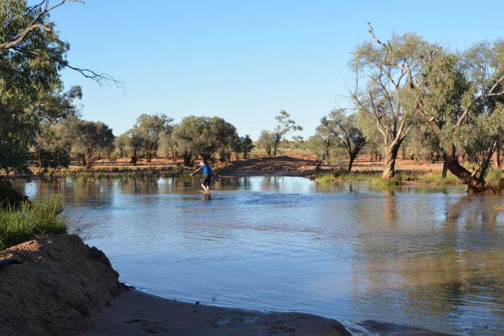 After our first scary crossing to the middle of the river I walked the second half to check on its depth