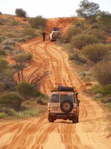 The Cool Convoy stops momentarily when one of the vehicles have to 'reload' over a sand dune. Photo:Kathy