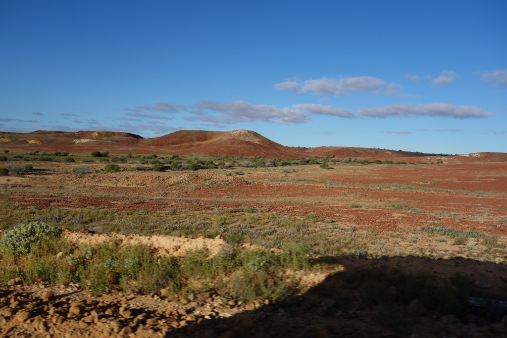 Low lying red hills started appearing as we moved south