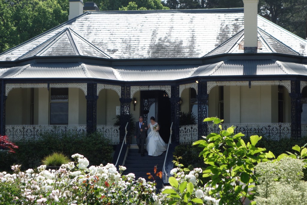 Gemma and her father Steve emerging from the historic house