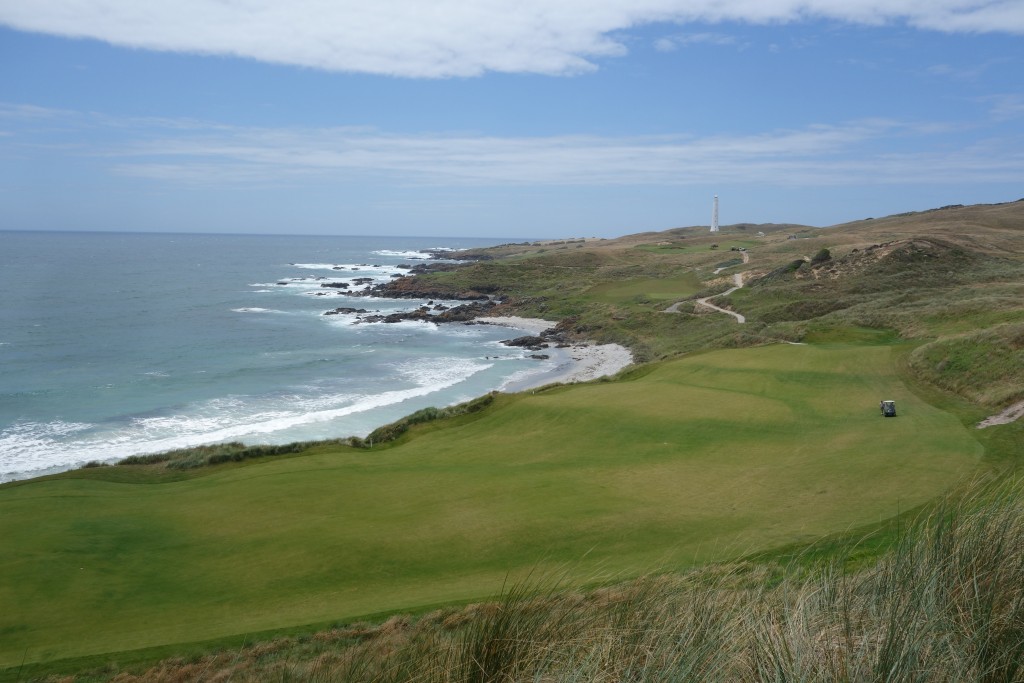 The views from the temporary clubhouse of the beautiful 18th hole of Cape Wickham with the lighthouse in the background