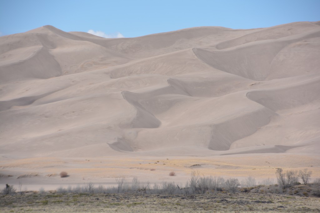 These extraordinary sand dunes sat between the flat desert and the soaring mountains