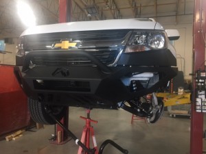 The Colorado had many modifications done to it, including a new large front bumper