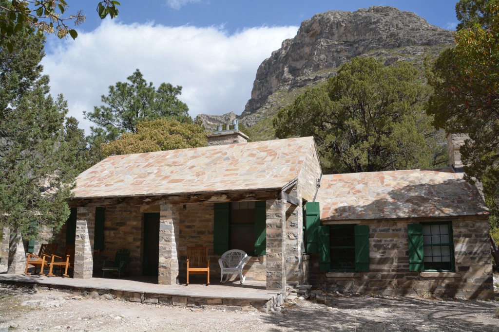 Pratt Cabin, built at the confluence of two creeks amongst tall trees 