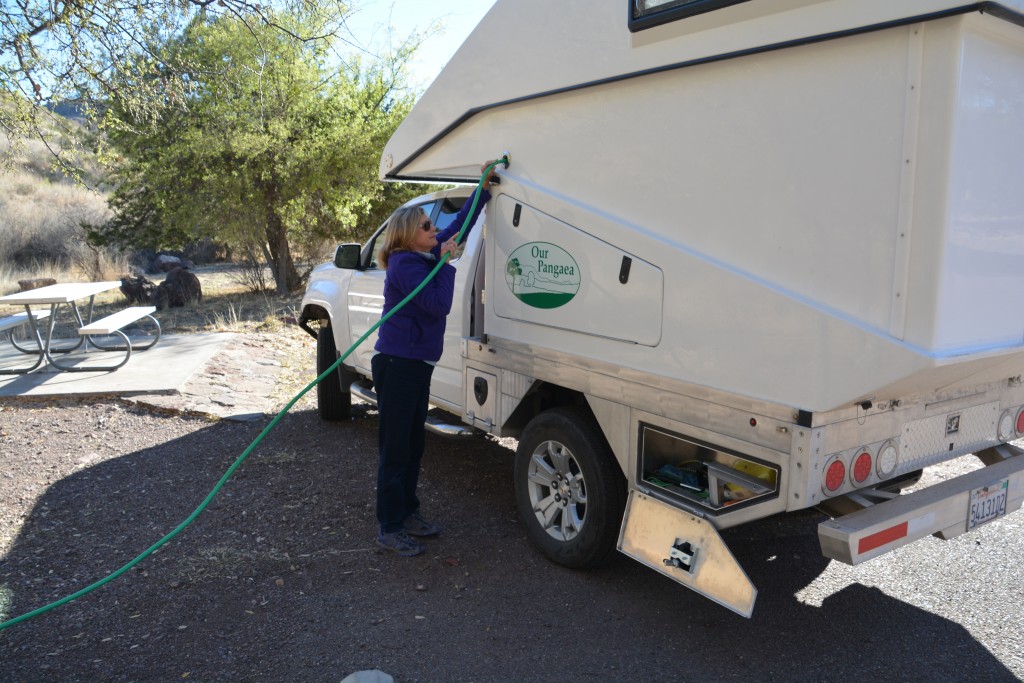 A regular task - Tramp carries 27 gallons of water for us to use in our travels and we need to fill it up oaccsionally