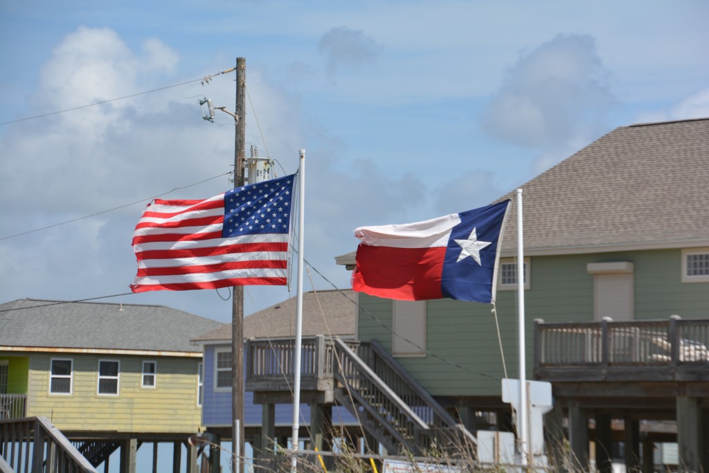 The Texas and American flags fly proudly everywhere we look