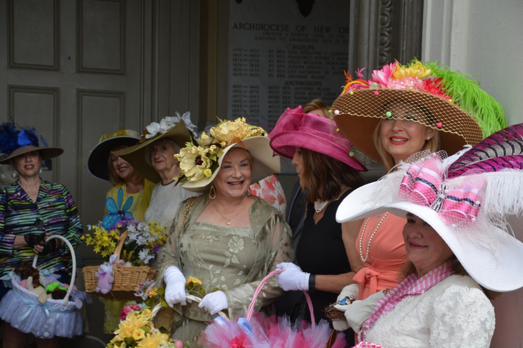 Large frilly hats and pastel sear sucker suits are still in vogue on Easter morning in the French Quarter