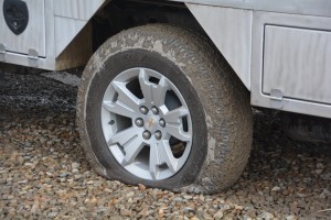 Every traveller's nightmare - a flat tire...on a miserable morning to boot!