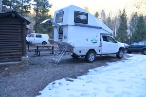 Tramp found a place to sleep near the snow - another cosy night inside