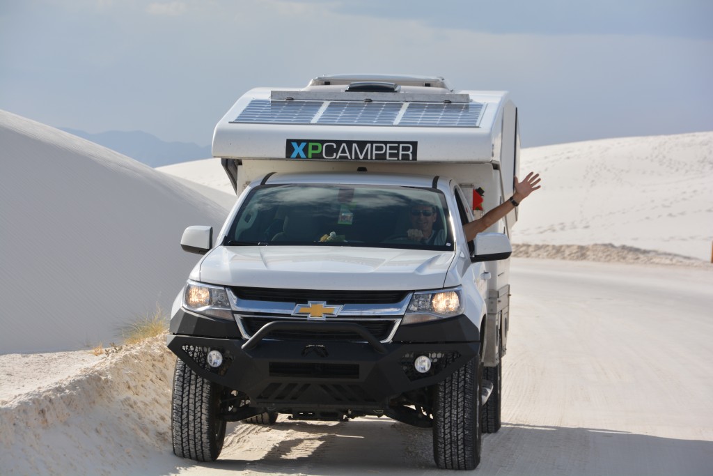 Tramp briefly resting next to some beautiful sand dunes at White Sands National Monument