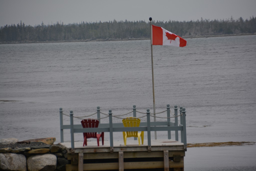 Lazing by a lake with the flag aflutter could really work if the sun ever came out