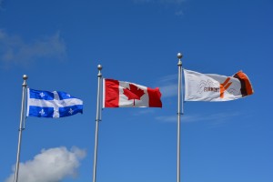 Our first sight in Quebec - their pretty blue and white flag and the local mining town's flag with the maple leaf