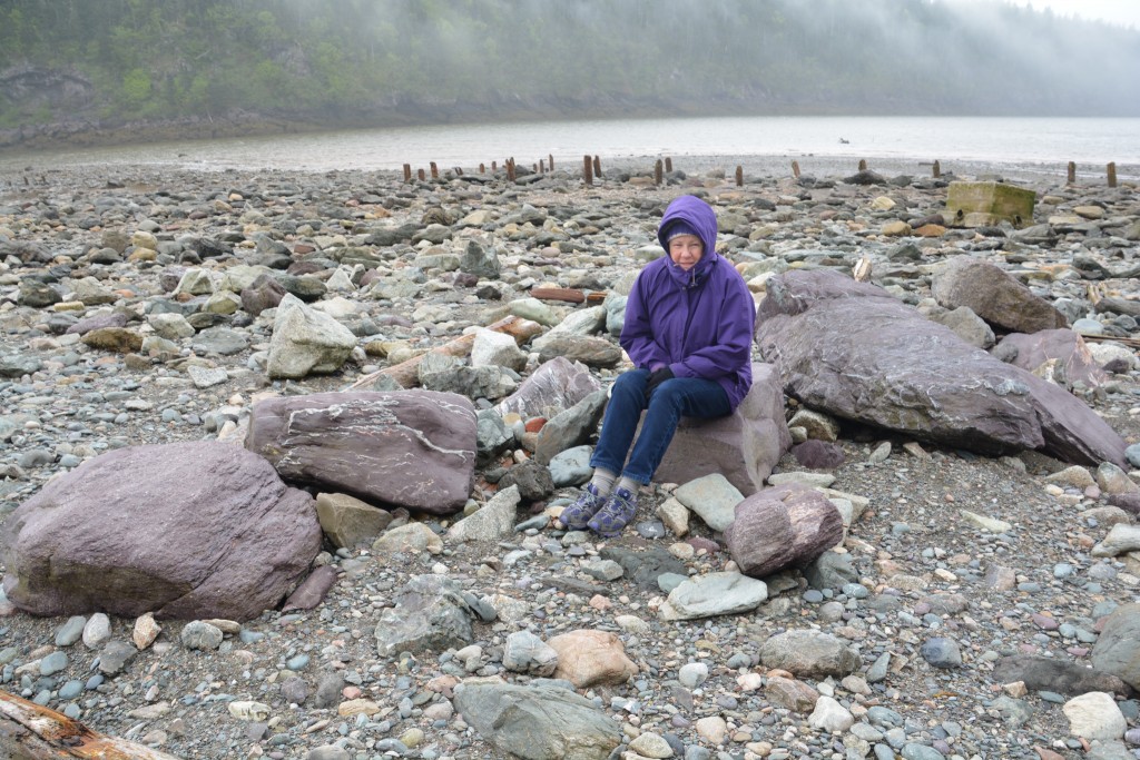 Its cold and miserable below sea level but Julie finds some nice matching purple rocks to rest on