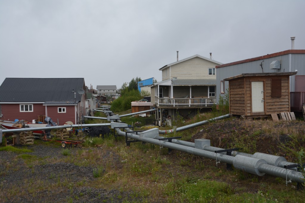 The sewage and water pipes run above ground so they don't impact the permafrost layer