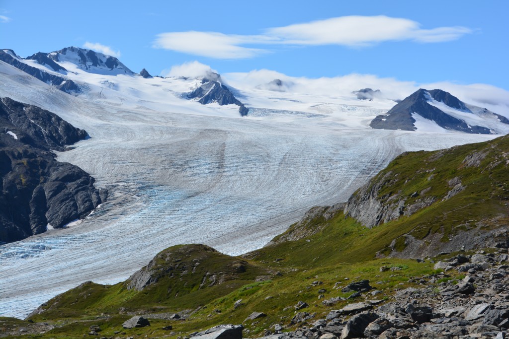 A stunning scene emerged as I neared the top - behind the glacier were mountain tops sticking out from the deep icefield