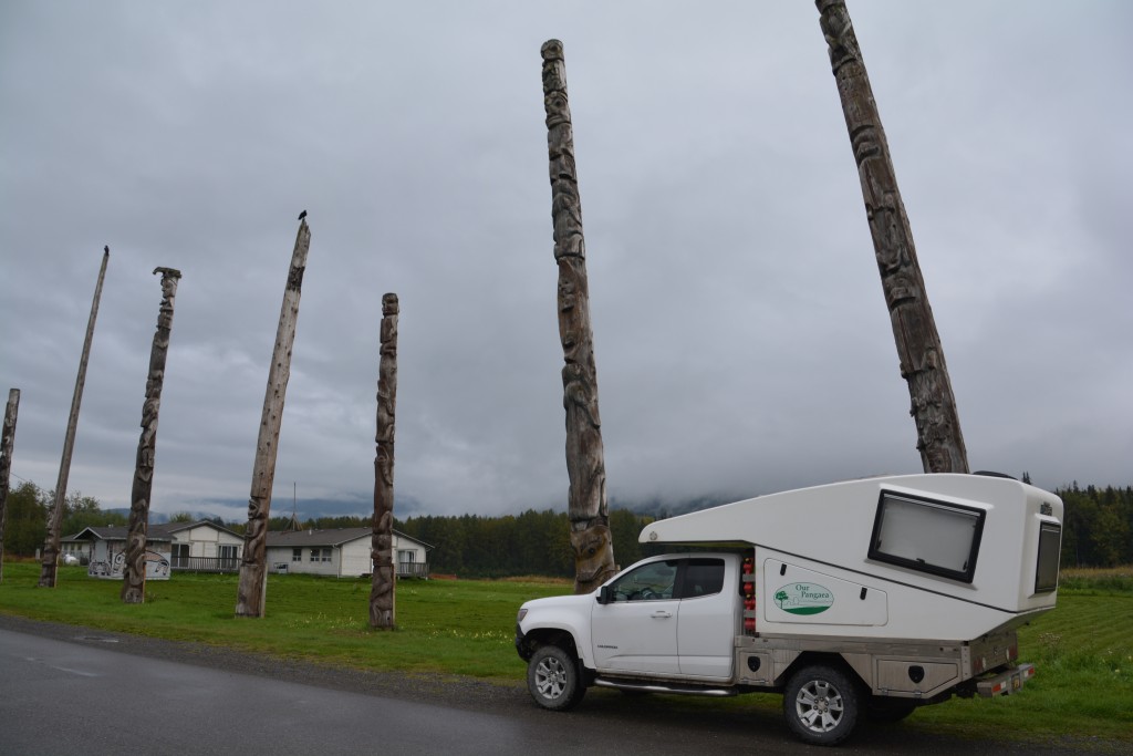 Tramp amongst giants - these totem poles were carved about 140 years ago and still stand to tell their special stories