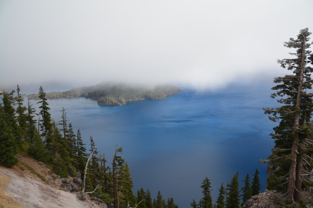 The clouds slowly rolled away and exposed spectacular Crater Lake in the bottom of the volcano