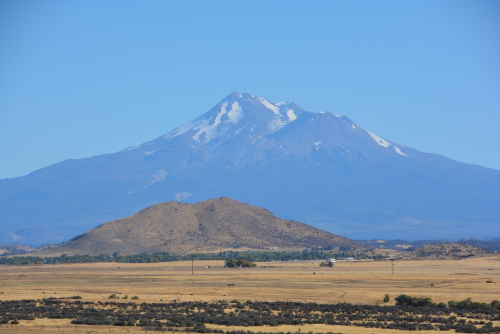 Mt. Shasta, another of the great volcanoes in the Cascade Range, looms up from the flat plains in northern California