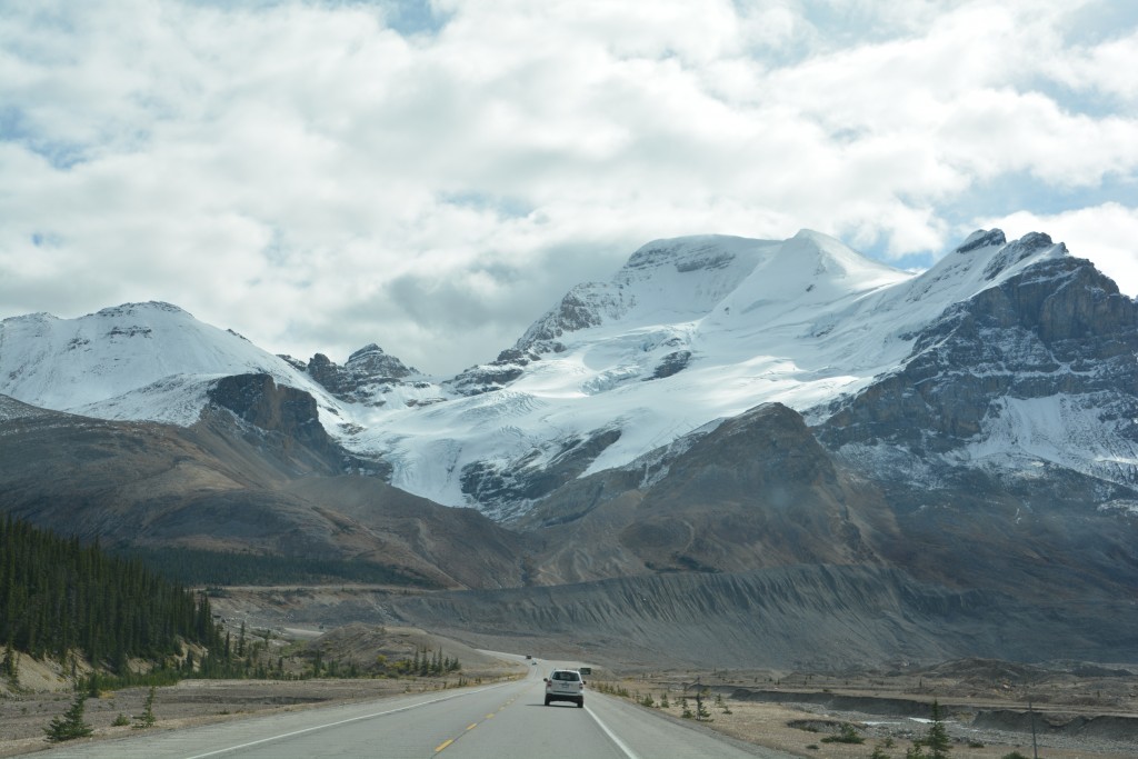 Many glaciers loomed over the road, almost reaching down to touch the passing cars